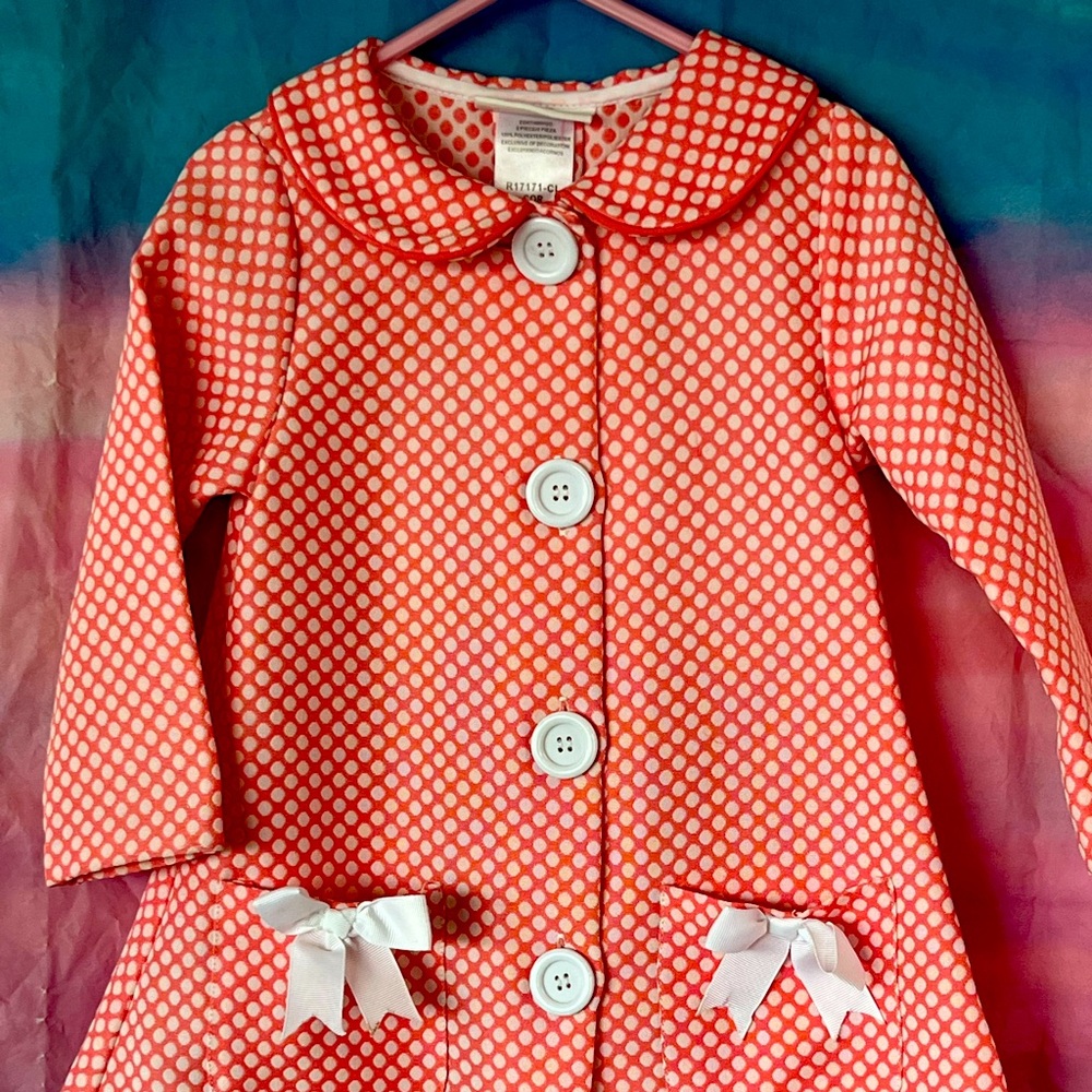 Pink and white micro polka dot over coat that would be perfect on your lovebugs.